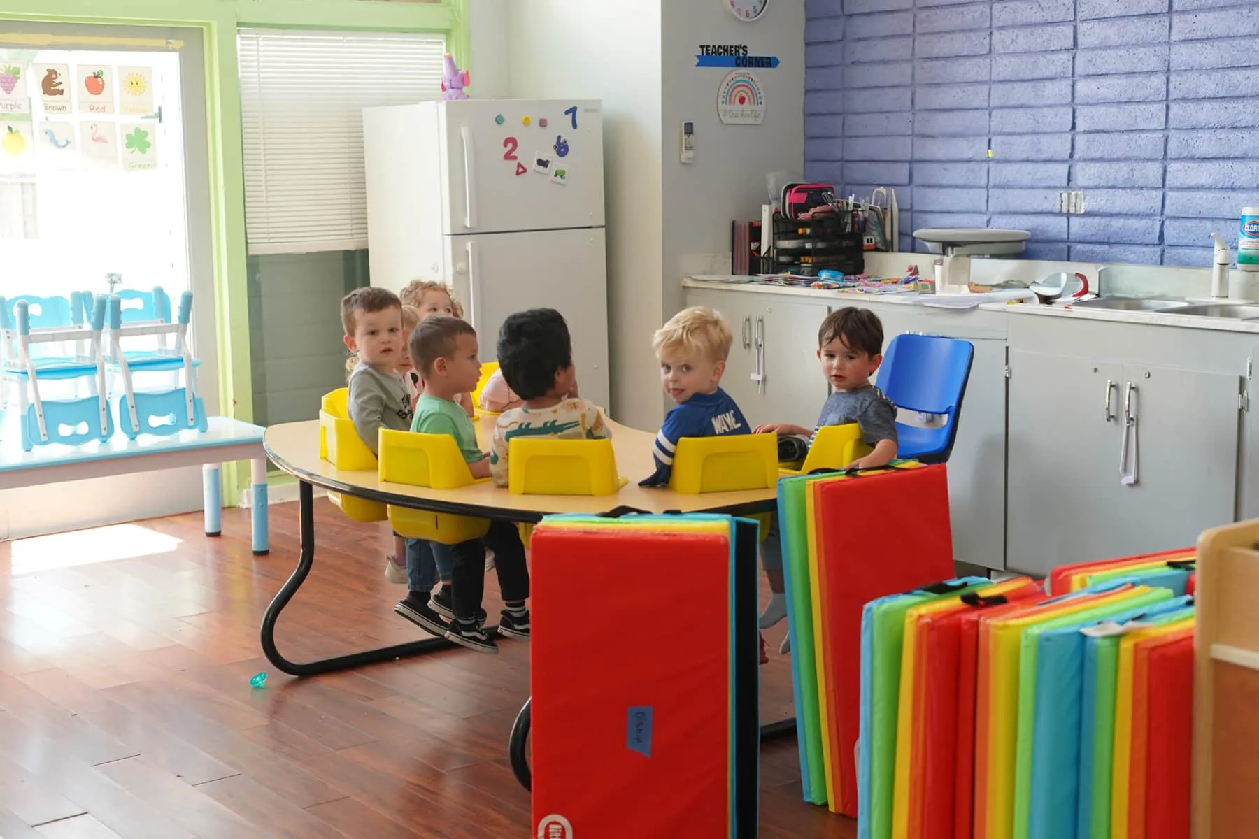 Preschool children gathering for interactive morning circle time at Creative Learners in Pleasanton