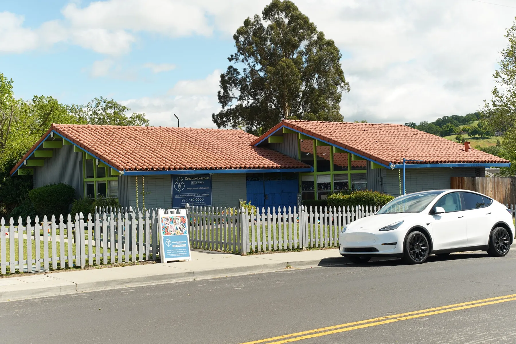 Spacious, secure outdoor playground at Creative Learners Child Care center