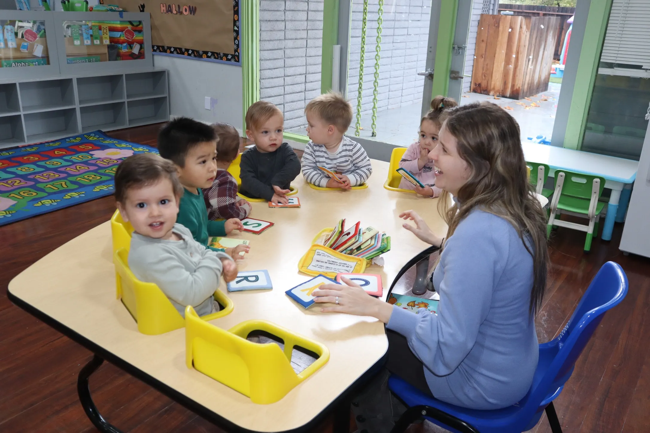 Safe, cheerful outdoor play and gross motor activities at Creative Learners campus playground